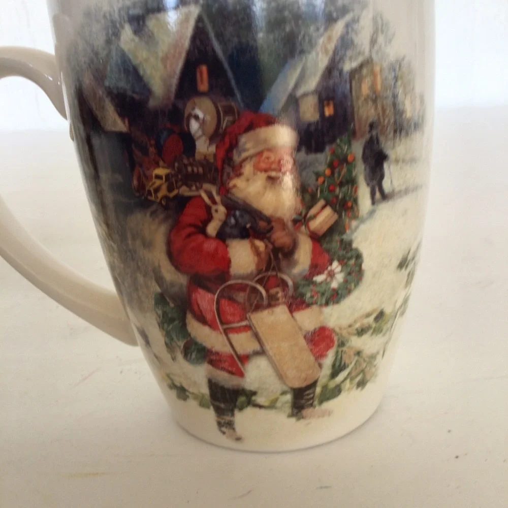 POTTERY BARN SET OF TWO NOSTALGIC SANTA MUGS